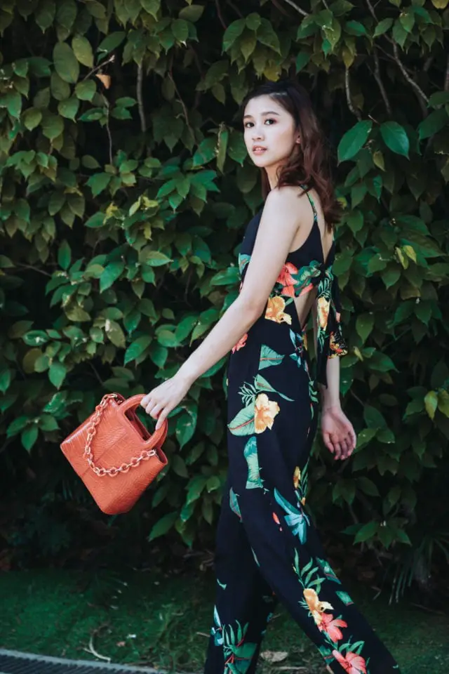 Black Sleeveless Jumpsuit with Tropical Floral Print — Classy Tropical Outfits