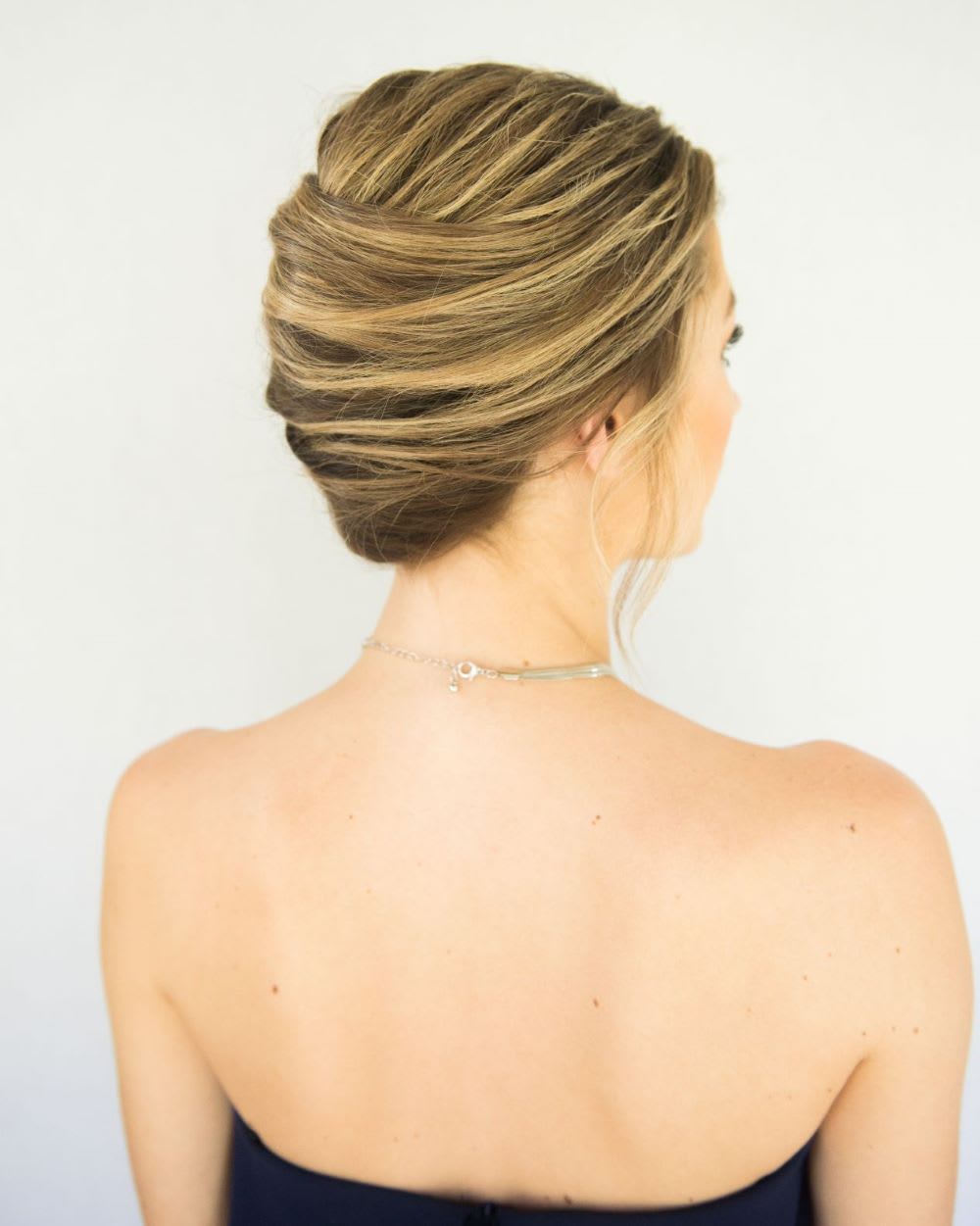 Honey Blonde Sculpted Twisted Low Bun — Classy Twist Updo