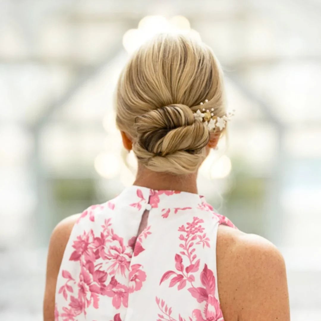Neat Blonde Twisted Low Bun With Flowers Neat Blonde Twisted Low Bun With Flowers — Classy Updo Wig