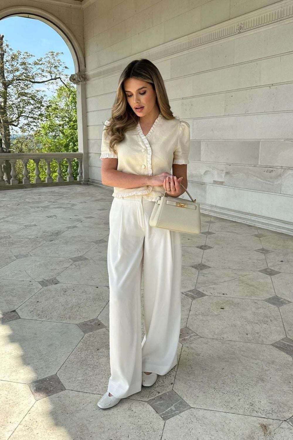 Cream Wide Leg Trousers With Ruffled Top Cream Wide Leg Trousers With Ruffled Top — Classy White Pants Outfits