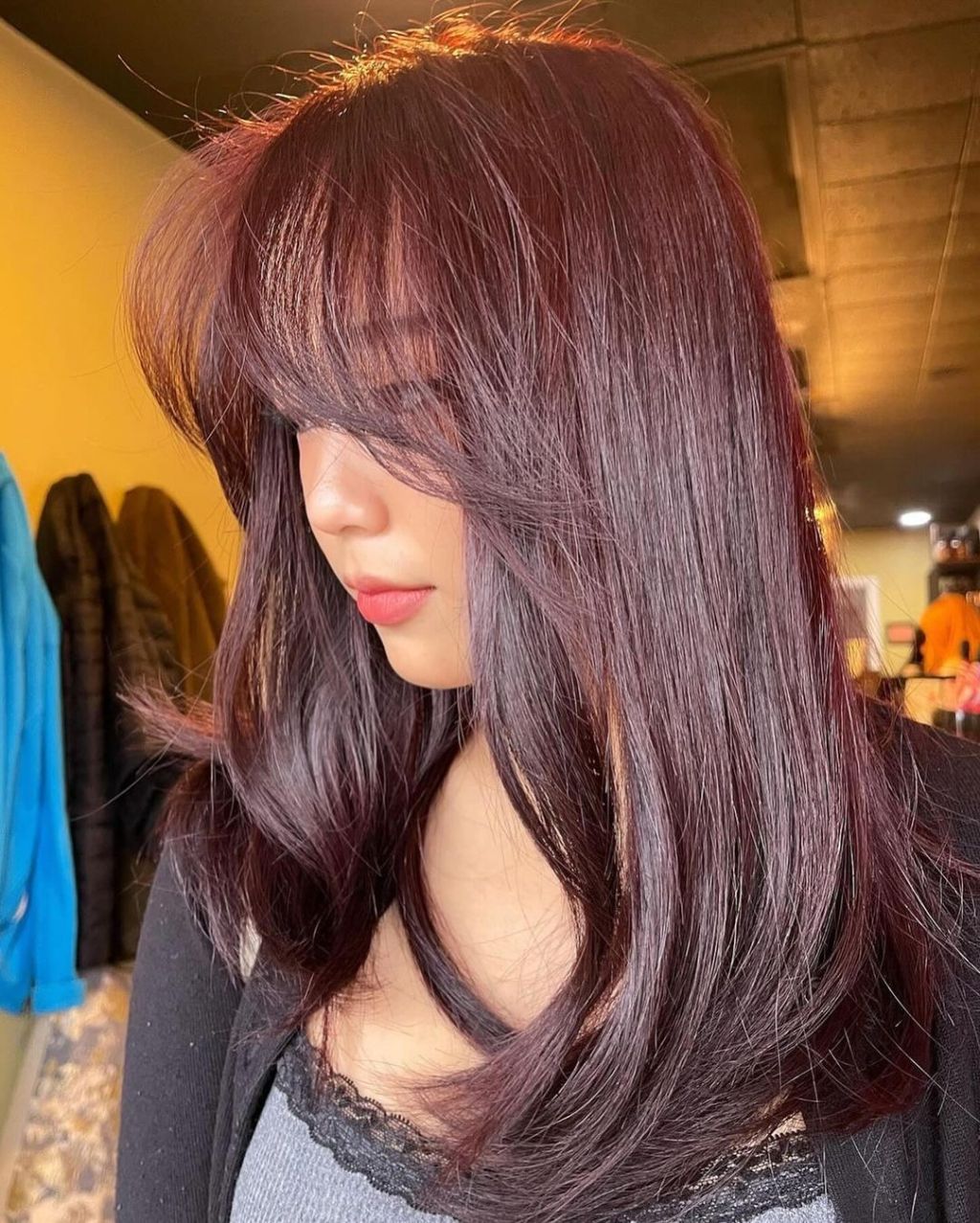 Collarbone Deep Auburn With Red Undertones and Curtain Bangs — Classy Wine Red Hair