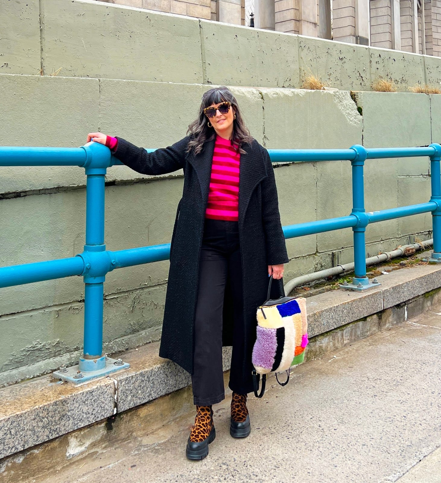 Black Textured Wool Coat with Striped Sweater and Jeans — Classy Wool Coat Outfits