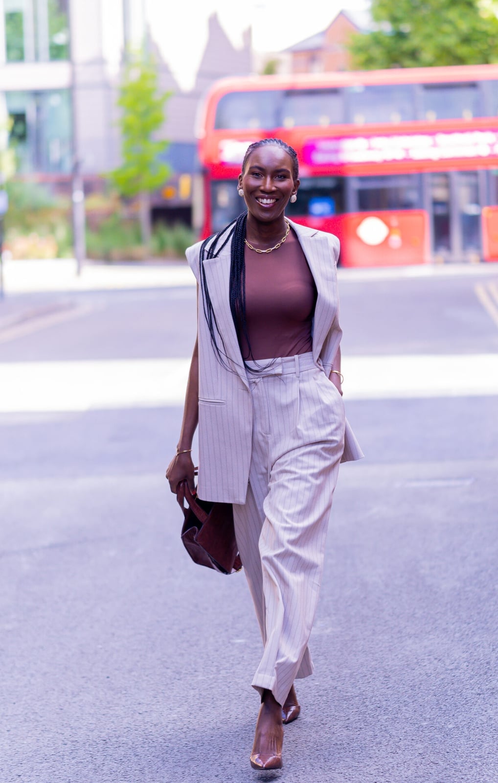 Beige Pinstripe Vest with Brown Top and Matching Wide-Leg Trousers Beige Pinstripe Vest with Brown Top and Matching Wide-Leg Trousers — Classy Work Outfits