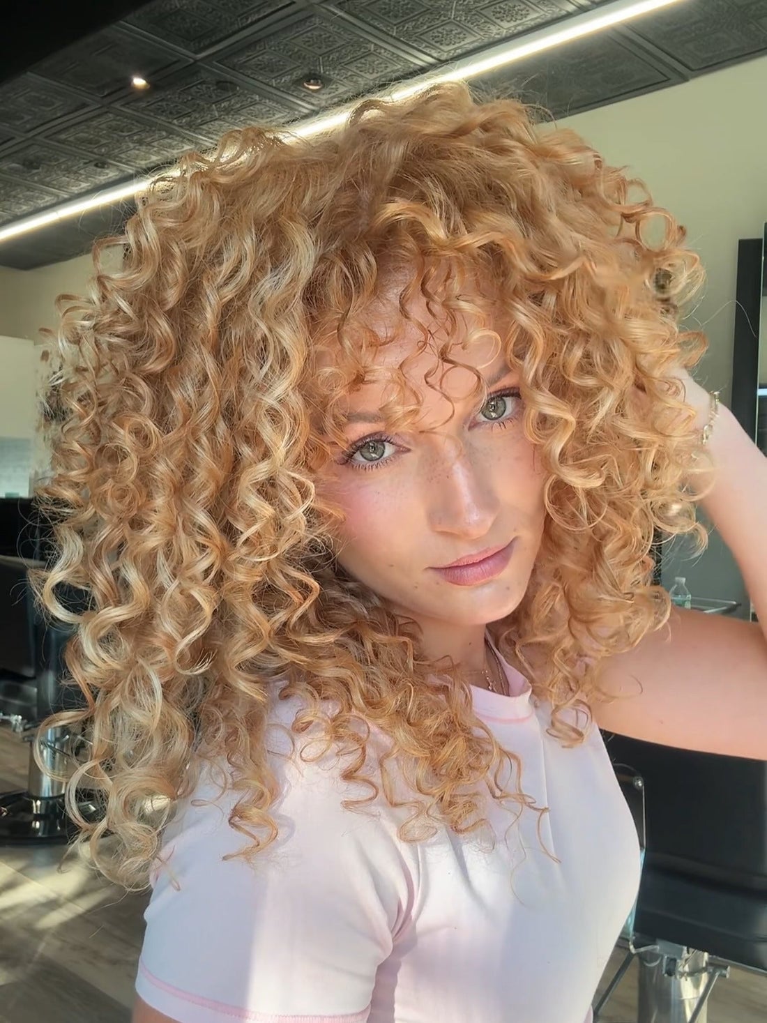 Collarbone Honey Blonde With Lighter Highlights — Curly Hair Dye Inspiration