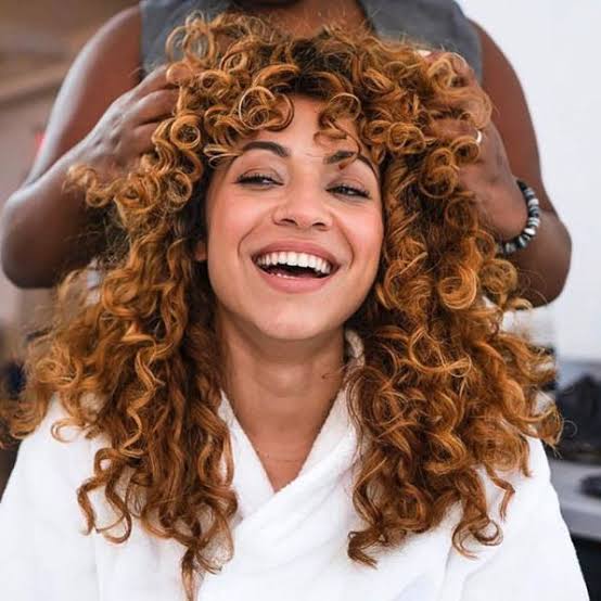 Collarbone Auburn With Lighter Auburn Highlights — Curly Hair Dye Inspiration