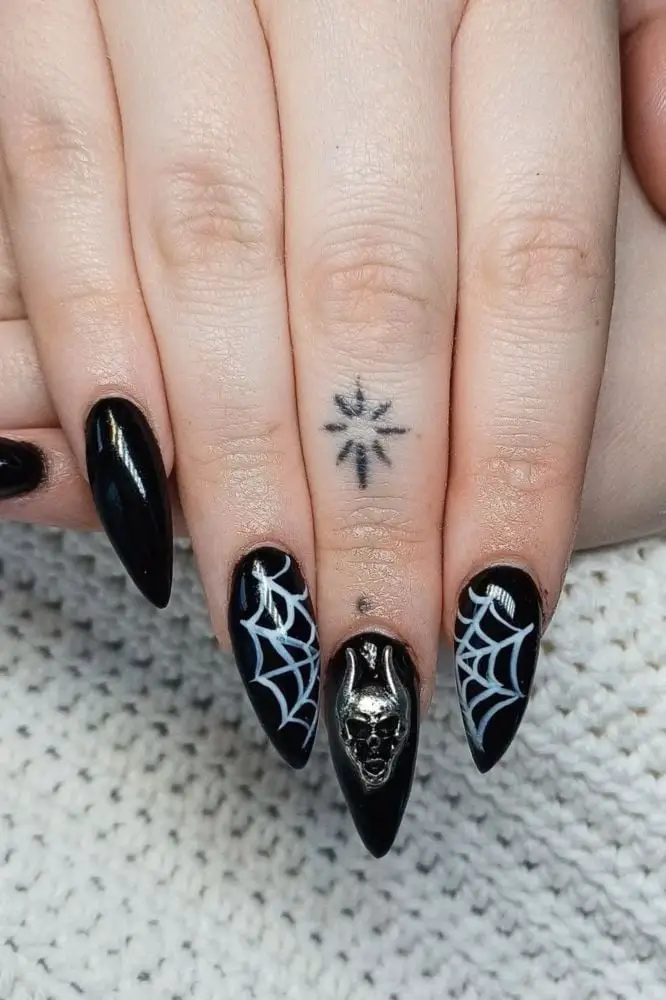 Medium Stiletto Black With White Spiderwebs and Skull Charm Medium Stiletto Black With White Spiderwebs and Skull Charm — Cute Black Nails