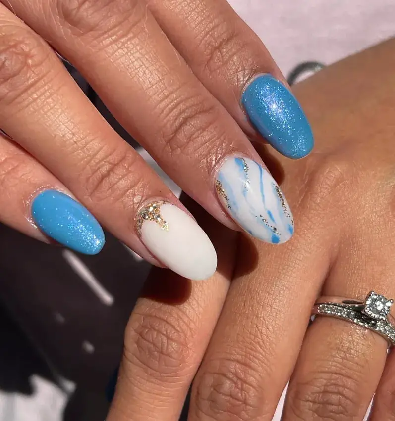 Short Shimmering Blue Almond Nails with Swirls — Cute Blue Almond Nails