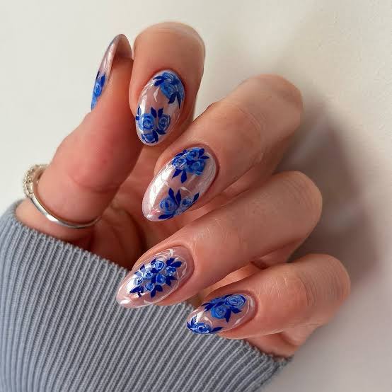 Medium Oval Sheer Base With Blue Floral Art — Cute Blue Nails