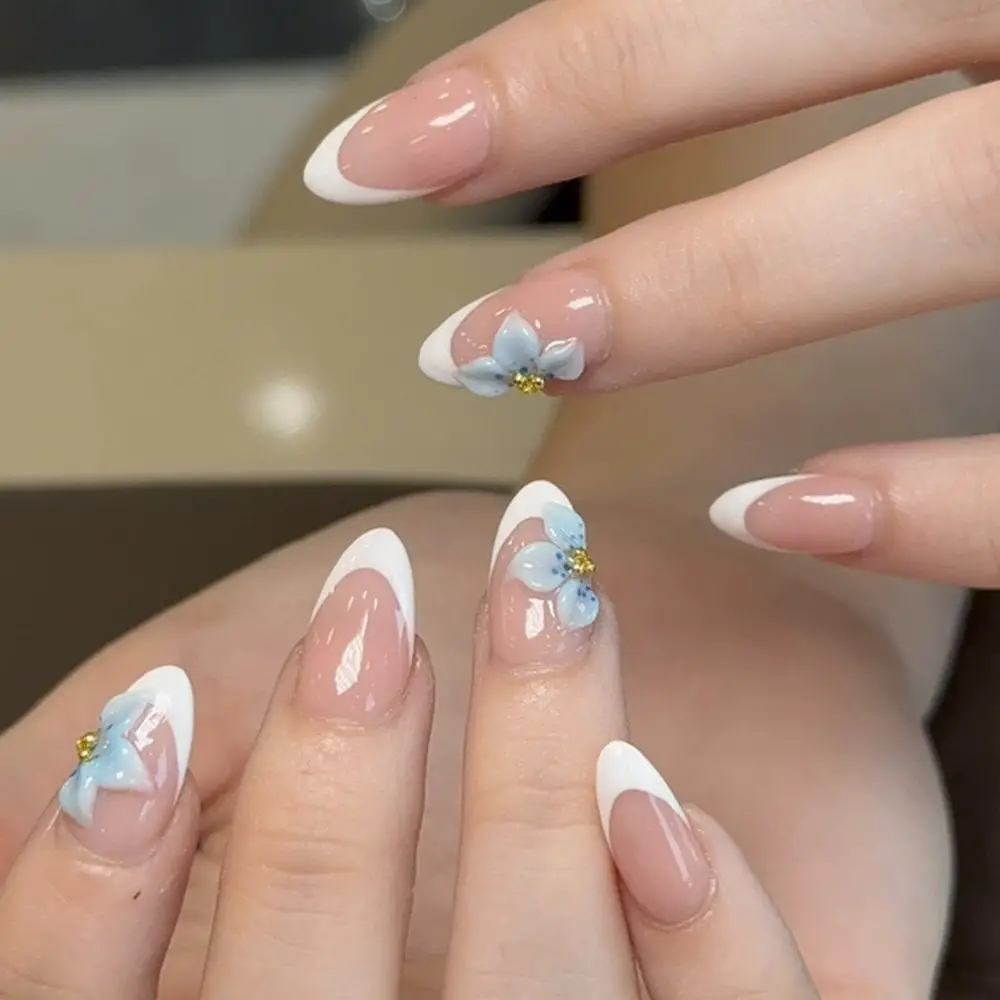 Medium Almond French Manicure With 3D Blue Flowers — Cute Gel X Nails