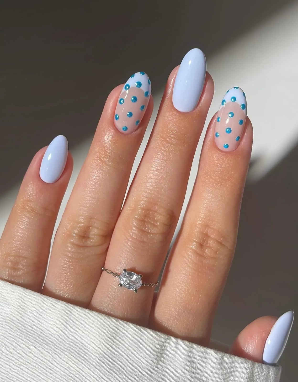 Pastel Blue Medium Oval With Scattered Dots Pastel Blue Medium Oval With Scattered Dots — Cute Medium Nails