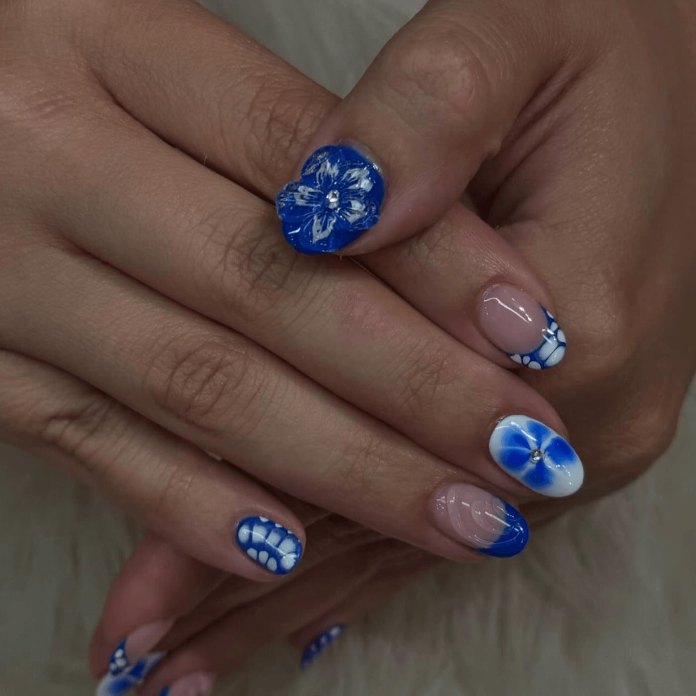 Blue Floral and Polka Dot Short Almond Nails Blue Floral and Polka Dot Short Almond Nails — Cute Short Gel Nails