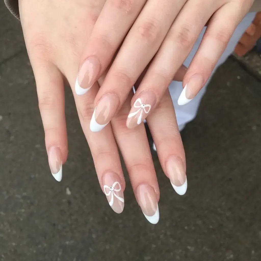 Medium Almond White Bow French Tip Nails Medium Almond White Bow French Tip Nails — Cute White Nails