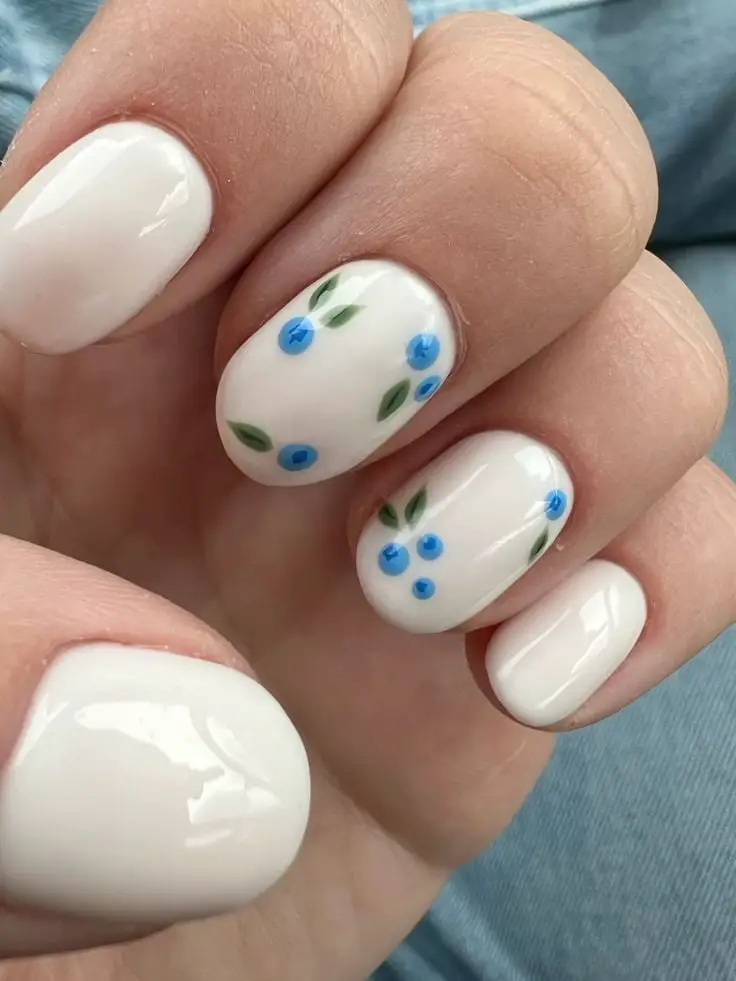 Medium Oval Solid White Floral Accent Nails Medium Oval Solid White Floral Accent Nails — Cute White Nails