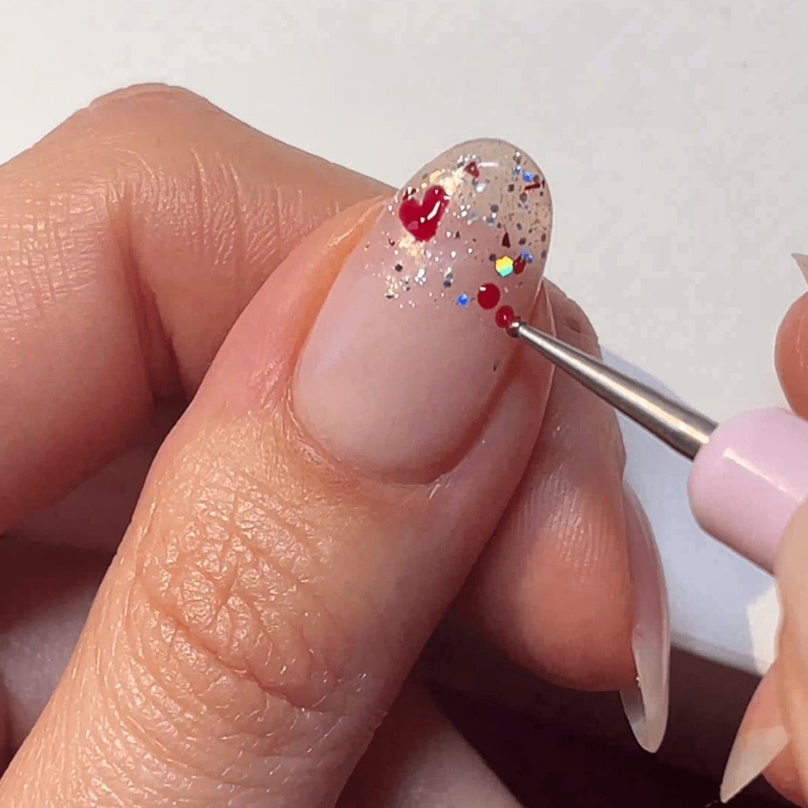 Medium Oval Nude With Red Heart And Glitter — Easy Nail Art Inspo