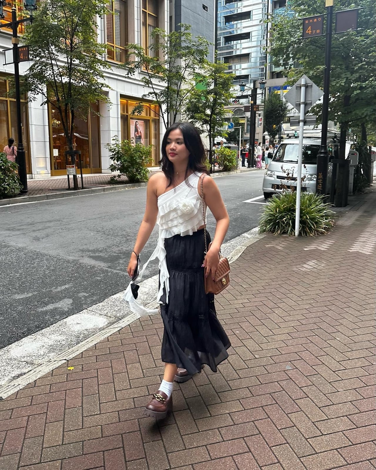Ruffled One-Shoulder Top With Tiered Black Maxi Skirt — Elegant Black Maxi Skirt Outfit