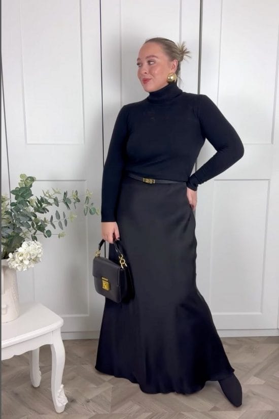 Long Satin Skirt With Turtleneck And Gold Earrings Long Satin Skirt With Turtleneck And Gold Earrings — Elegant Black Satin Skirt Outfit