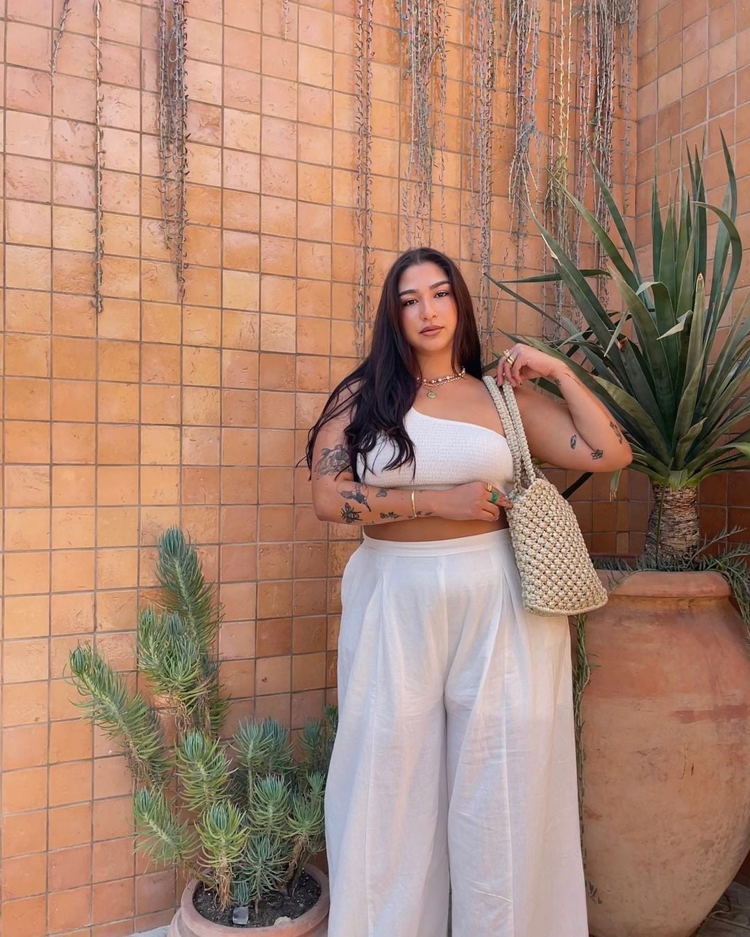 White One-Shoulder Knit Top and Linen Trousers — Elegant Hot Weather Outfits