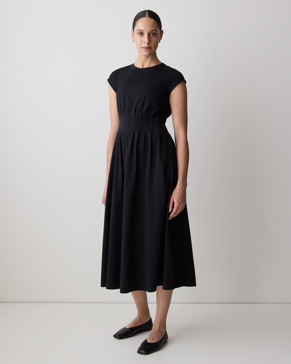 Black Crew Neck Pleated Skirt Midi Dress, Close-Up Take — Elegant Midi Dresses