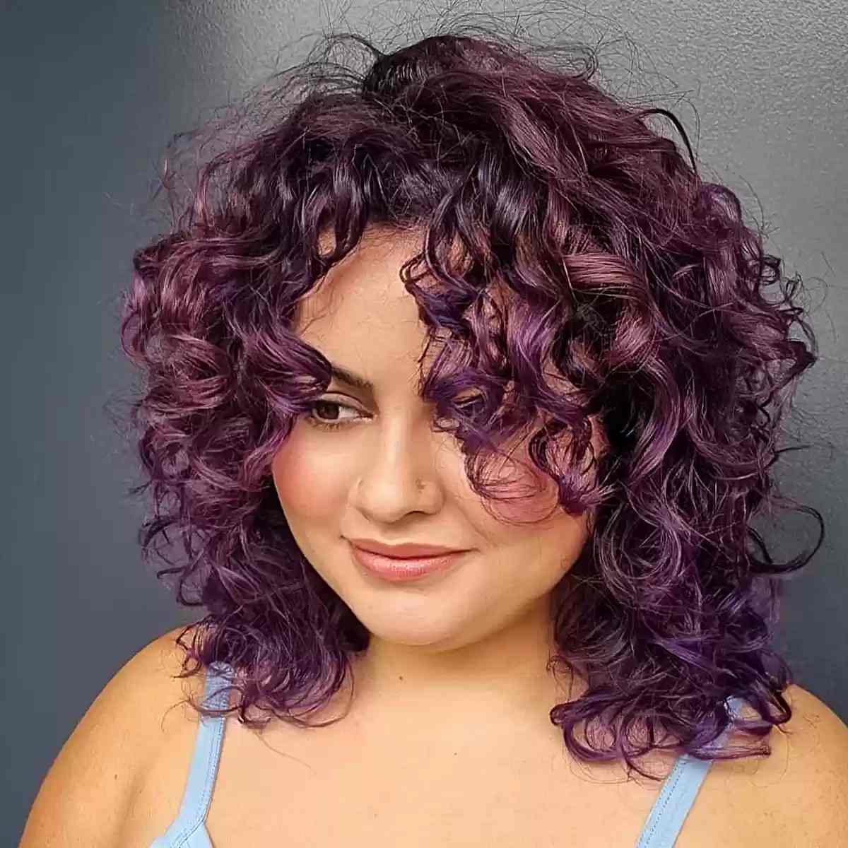 Collarbone Length Muted Purple Curls Collarbone Length Muted Purple Curls — Purple Hair Dye Inspiration