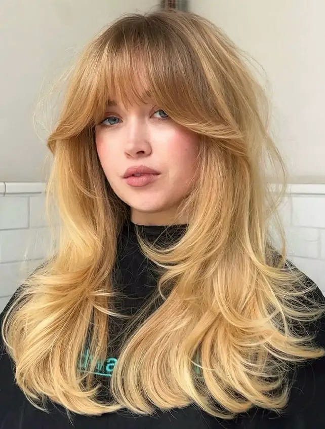 Mid-Back Ash Blonde Blowout With Curtain Bangs — Simple 90s Blowout Hair