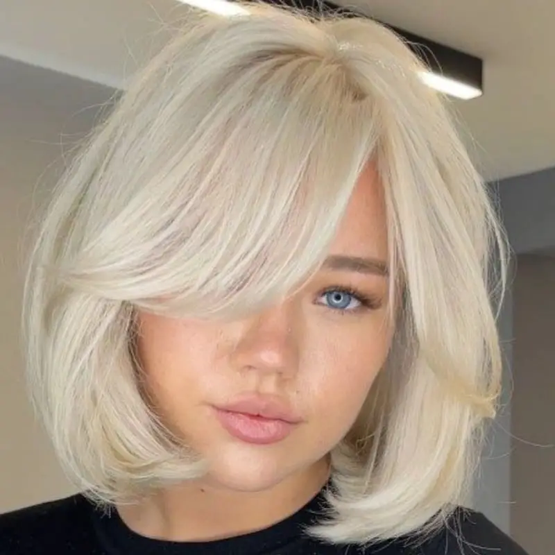 Platinum Blonde Bob With Face Framing Layers Platinum Blonde Bob With Face Framing Layers — Simple A-Line Bob