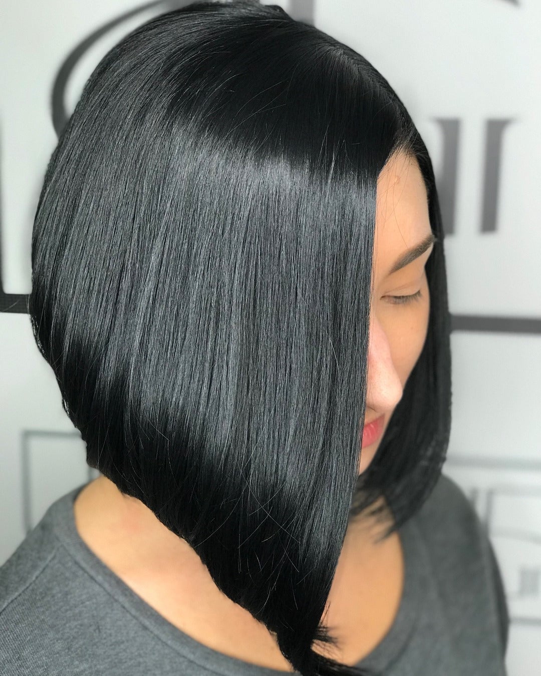 Sleek Black Angled Collarbone Bob Sleek Black Angled Collarbone Bob — Simple Asymmetrical Bob