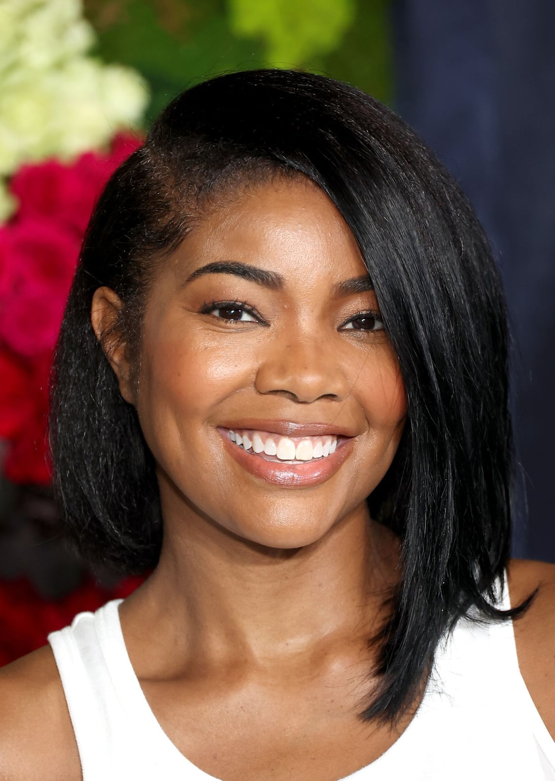 Black Bob Tucked Behind Ear Black Bob Tucked Behind Ear — Simple Asymmetrical Bob
