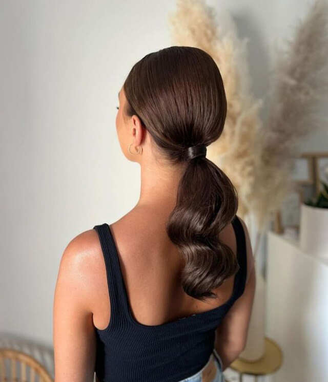 Low Ponytail With Glossy Waves Low Ponytail With Glossy Waves — Simple Back Haircuts