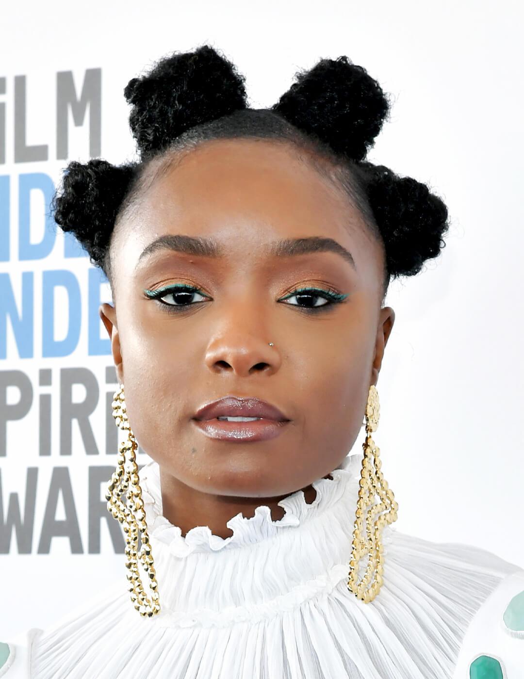 Bantu Knots with Ruffled High-Neck Top and Chandelier Earrings Bantu Knots with Ruffled High-Neck Top and Chandelier Earrings — Simple Bantu Knots