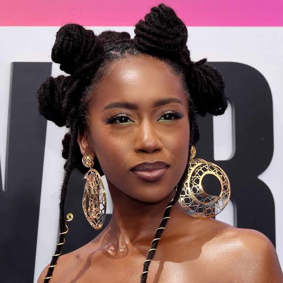 Bantu Knots with Black Off-The-Shoulder Top and Large Gold Earrings Bantu Knots with Black Off-The-Shoulder Top and Large Gold Earrings — Simple Bantu Knots