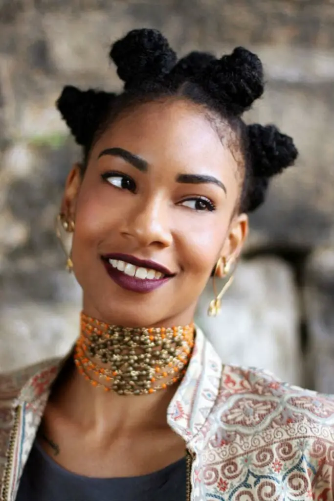 Patterned Jacket Over a Dark Top with Bantu Knots Patterned Jacket Over a Dark Top with Bantu Knots — Simple Bantu Knots