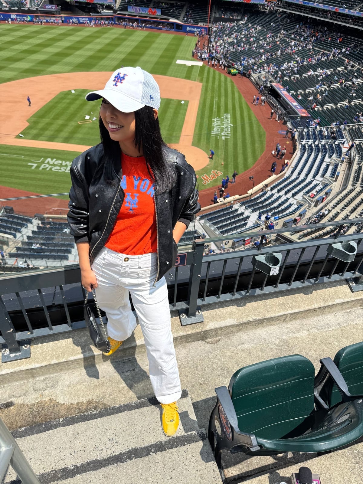 Studded Bomber Jacket Over Graphic T-Shirt Studded Bomber Jacket Over Graphic T-Shirt — Simple Baseball Game Outfits