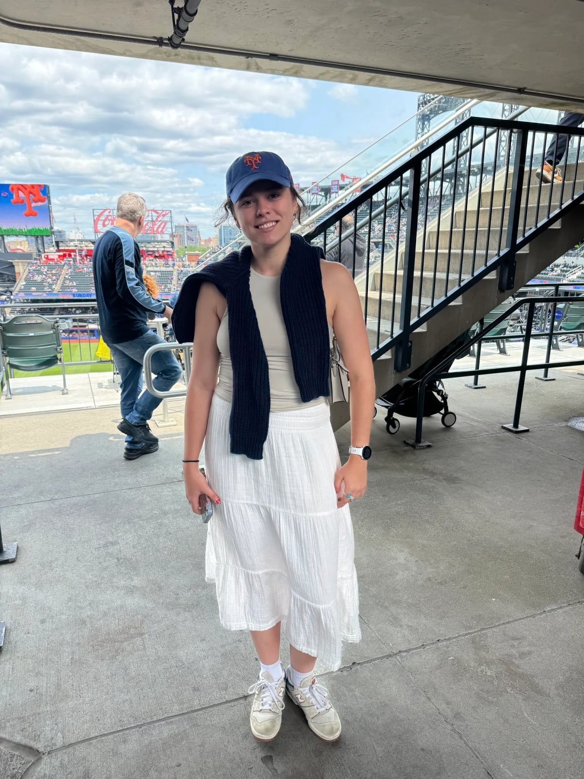Tiered White Skirt with Draped Navy Sweater Tiered White Skirt with Draped Navy Sweater — Simple Baseball Game Outfits