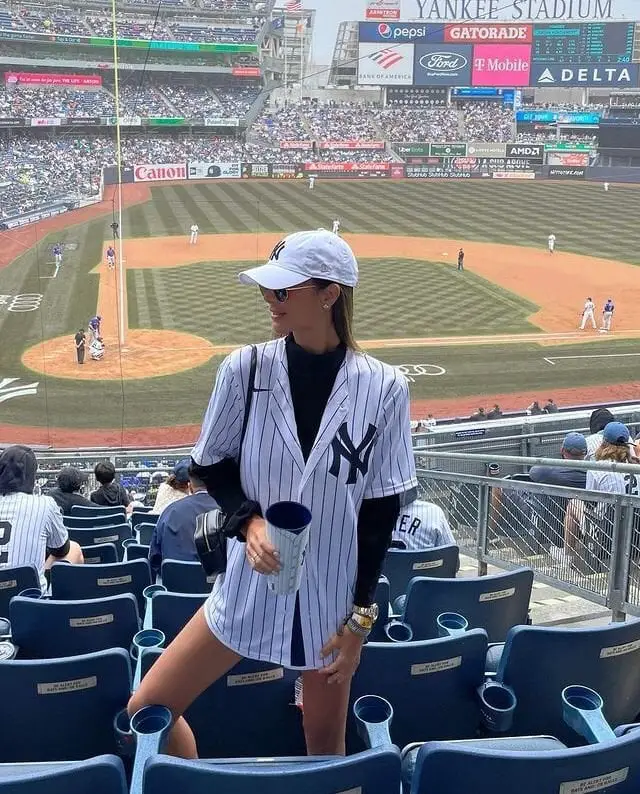 Pinstripe Baseball Jersey Over Long Sleeves Pinstripe Baseball Jersey Over Long Sleeves — Simple Baseball Game Outfits