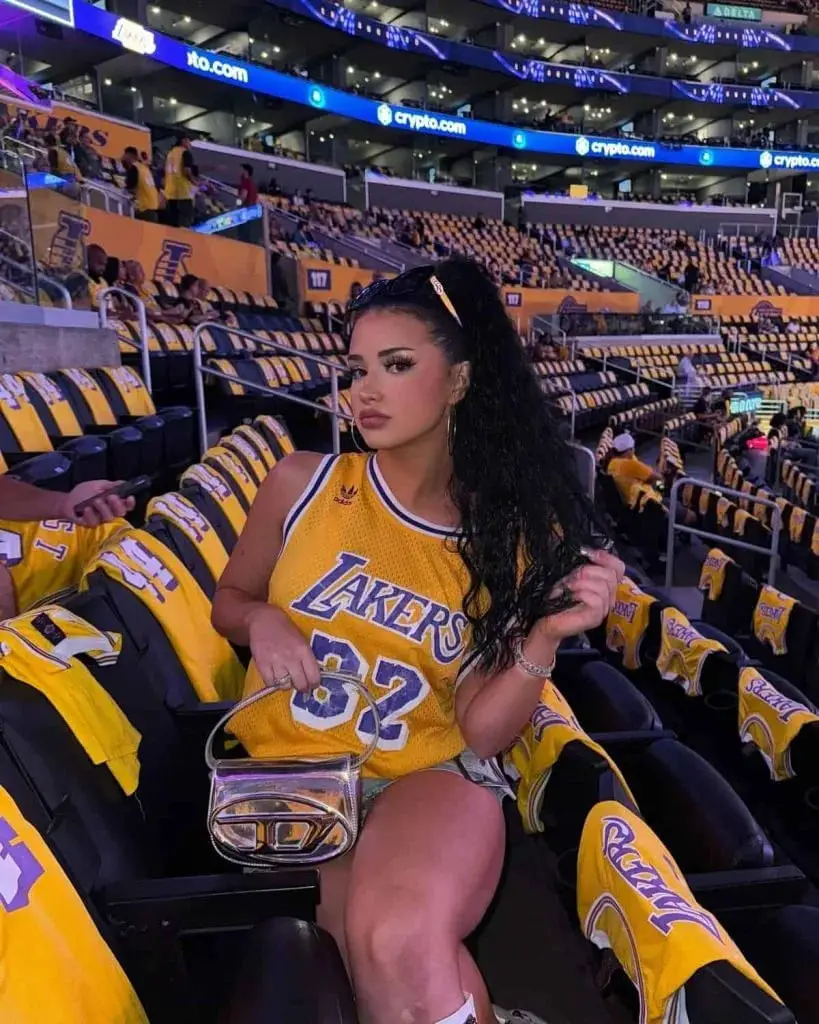 Basketball Jersey with Denim Shorts and Clear Handbag Basketball Jersey with Denim Shorts and Clear Handbag — Simple Basketball Game Outfits