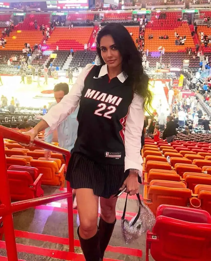 Basketball Jersey Over Long Sleeve with Pinstripe Skirt Basketball Jersey Over Long Sleeve with Pinstripe Skirt — Simple Basketball Game Outfits