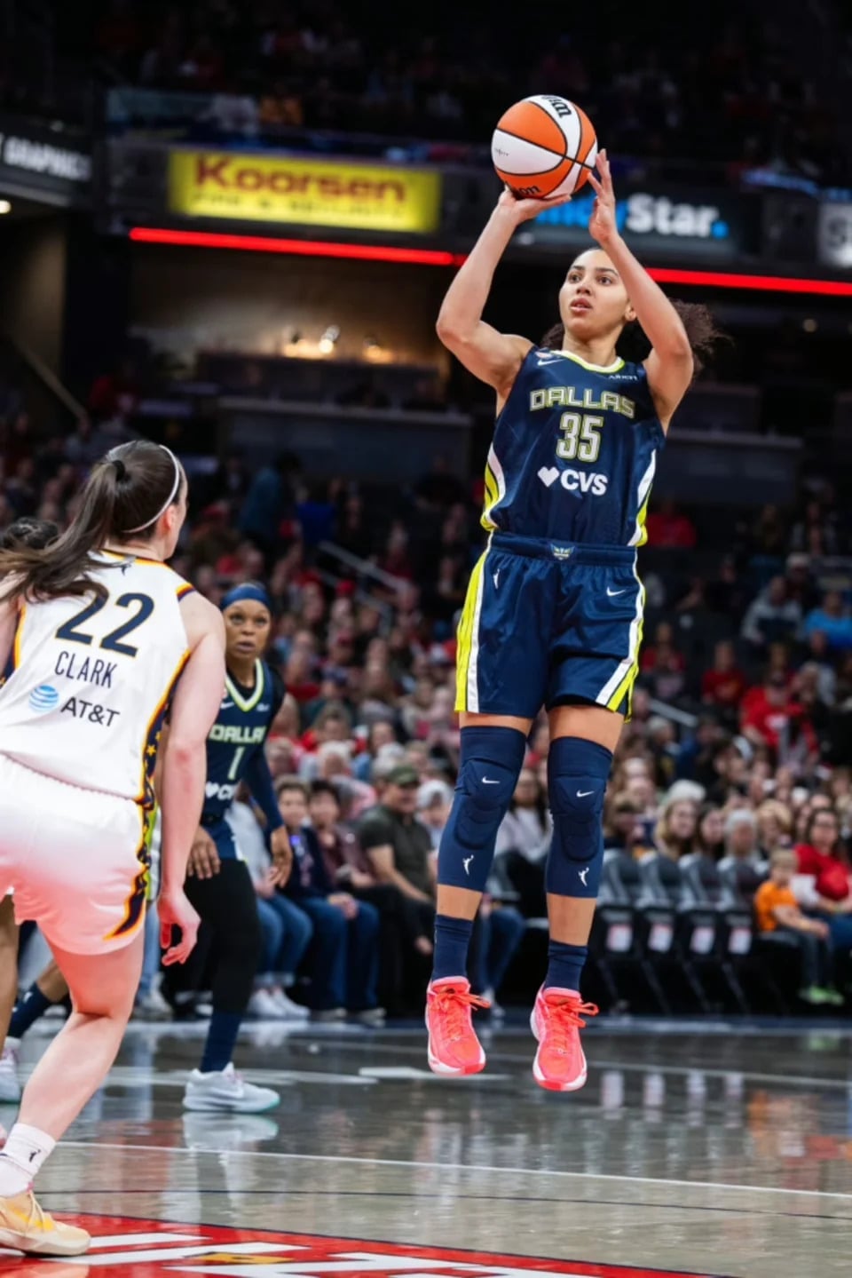 Basketball Player in Action with Pink Sneakers Basketball Player in Action with Pink Sneakers — Simple Basketball Game Outfits