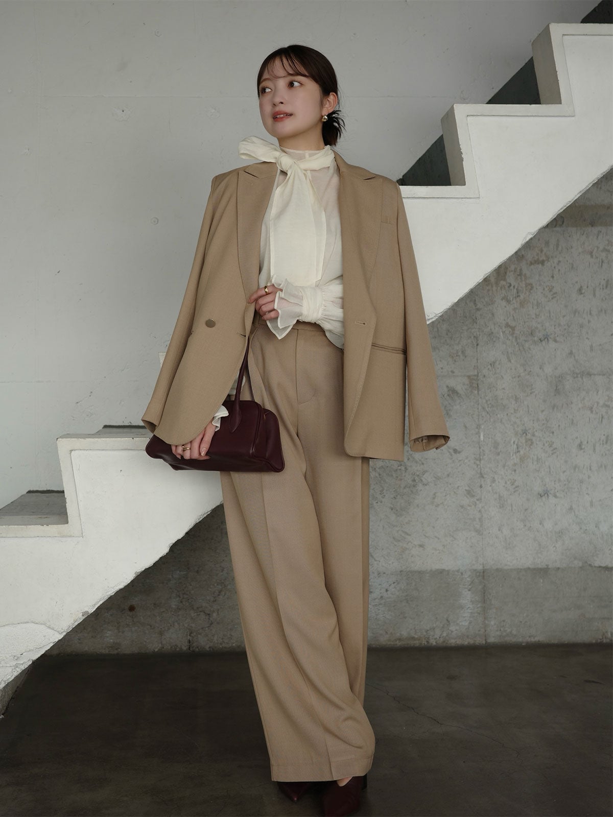 Beige Wide-Leg Trousers with Sheer Bow Blouse, Close-Up Take Beige Wide-Leg Trousers with Sheer Bow Blouse, Close-Up Take — Simple Beige Pants Outfits