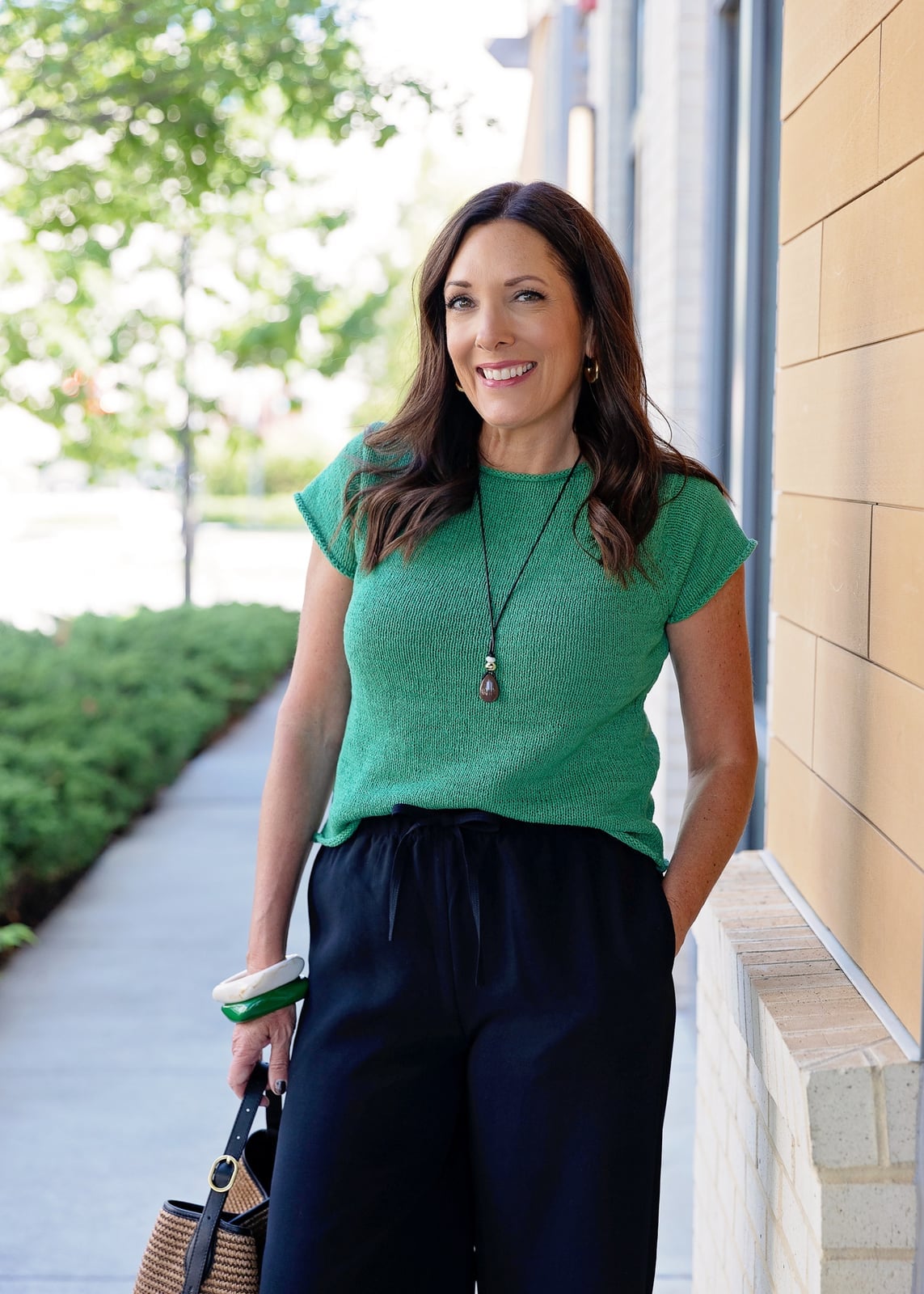 Black Drawstring Trousers With Green Knit Top and A Woven Tote Bag Black Drawstring Trousers With Green Knit Top and A Woven Tote Bag — Simple Black Pants Outfits