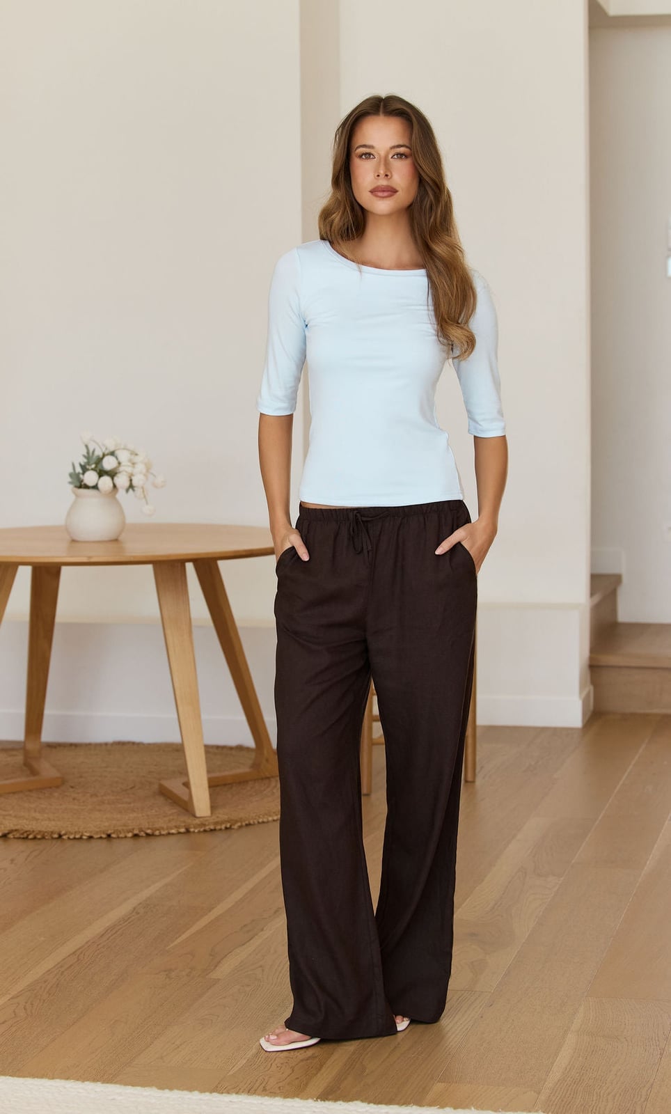 Sky Blue Boat Neck Top with Dark Brown Wide-Leg Trousers Sky Blue Boat Neck Top with Dark Brown Wide-Leg Trousers — Simple Blue Top Outfits