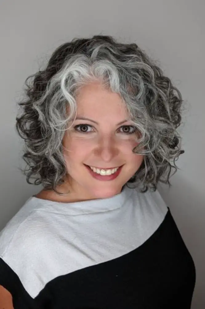 Chin Length Bob With Gray Streaks And Curls Chin Length Bob With Gray Streaks And Curls — Simple Bob with Curls