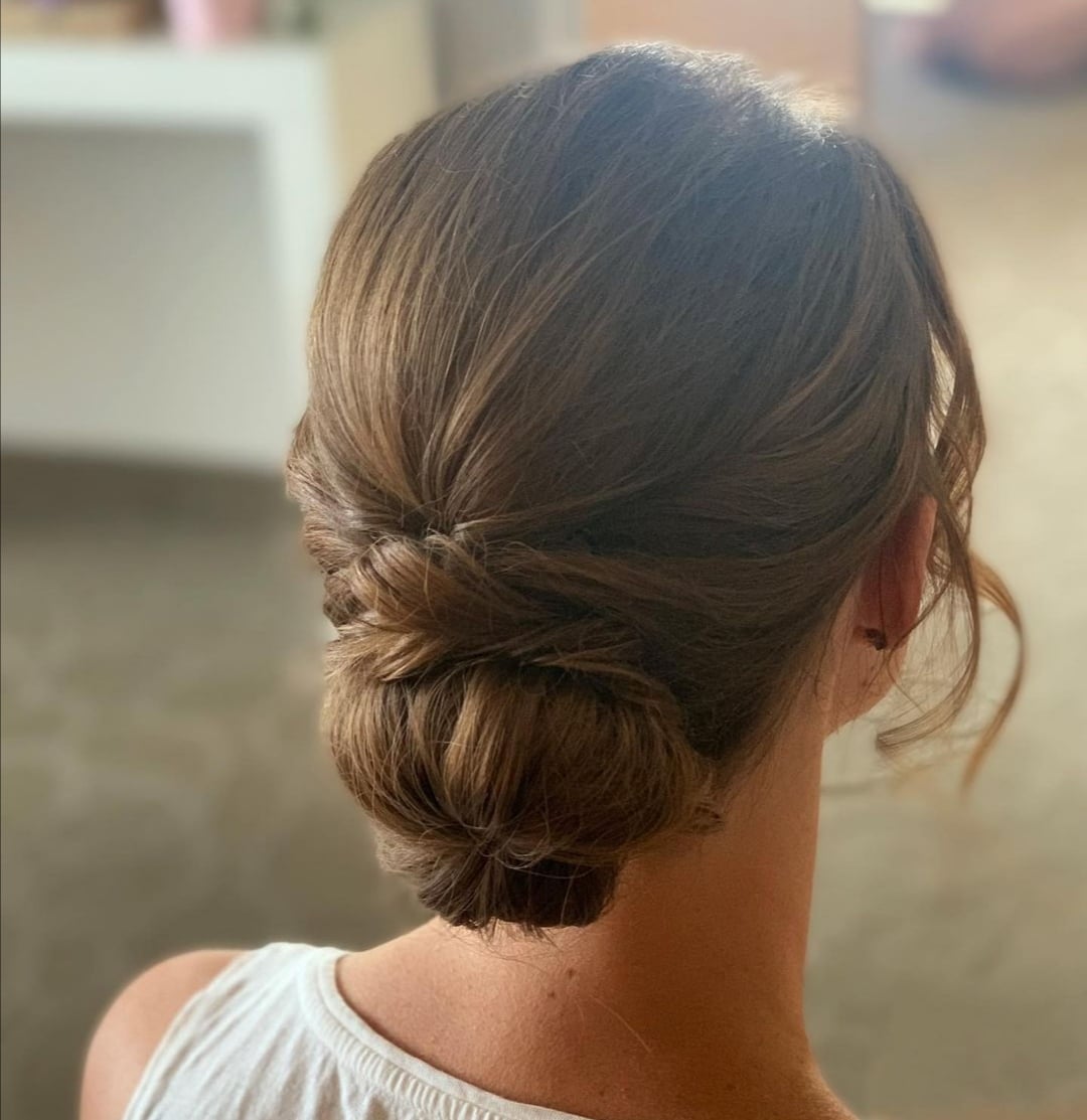 Brown Twisted Low Bun With Wisps — Simple Bridal Bun
