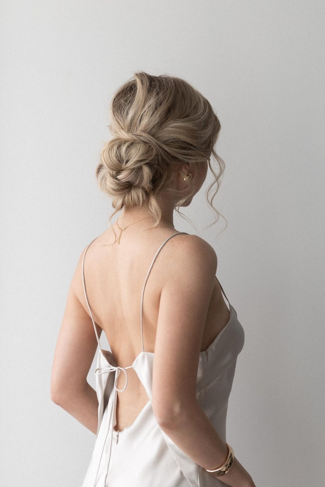 Ash Blonde Wavy Updo With Face-Framing Strands — Simple Bridal Bun