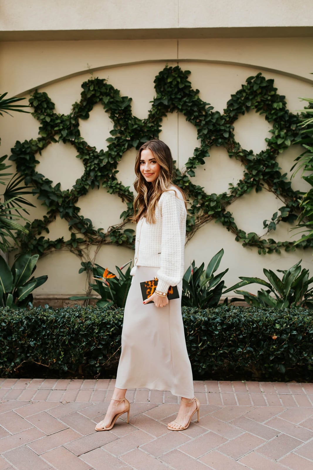 Cream Cardigan Over Beige Satin Slip Skirt — Simple Bridal Shower Outfits for Guest