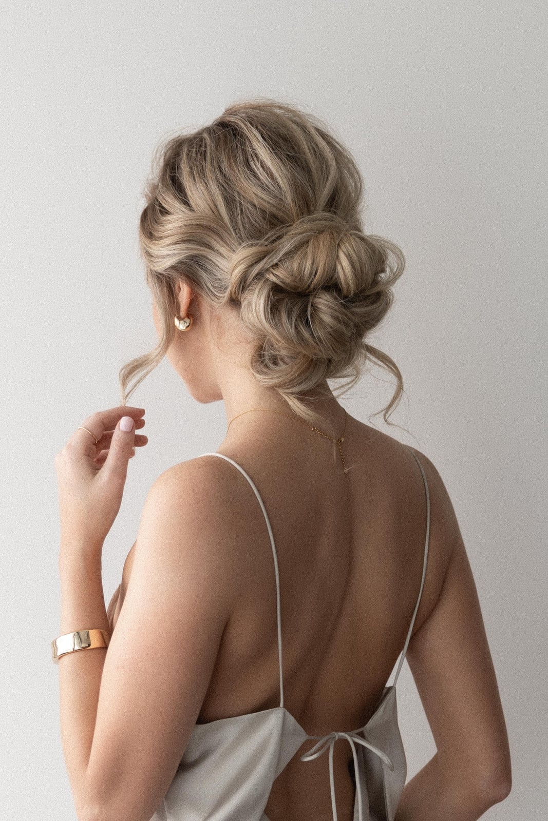 Twisted Chignon With Soft Wisps Twisted Chignon With Soft Wisps — Simple Bridesmaid Updos