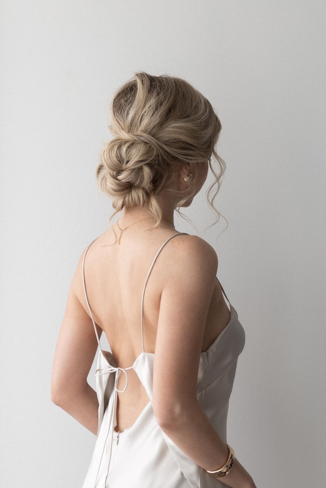 Messy Bun With Soft Twists Messy Bun With Soft Twists — Simple Bridesmaid Updos