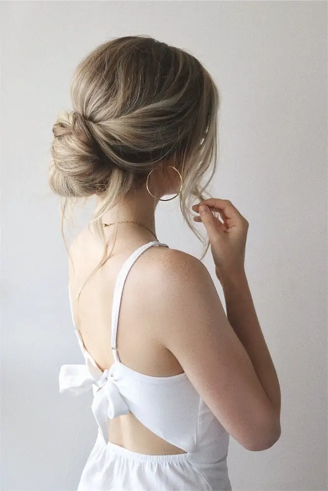 Loose Textured Low Bun With Wisps Loose Textured Low Bun With Wisps — Simple Bridesmaid Updos