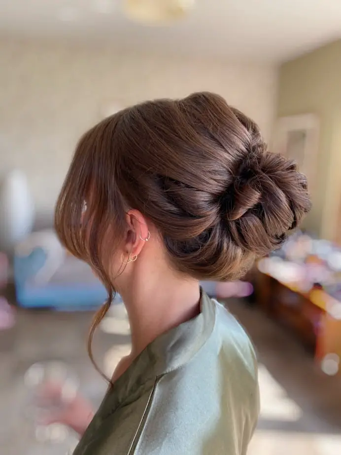 Sophisticated Twisted Updo With Side Swept Bangs Sophisticated Twisted Updo With Side Swept Bangs — Simple Bridesmaid Updos