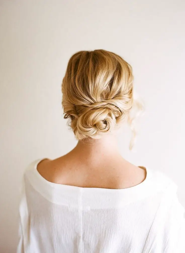 Neat Low Twisted Bun Neat Low Twisted Bun — Simple Bridesmaid Updos