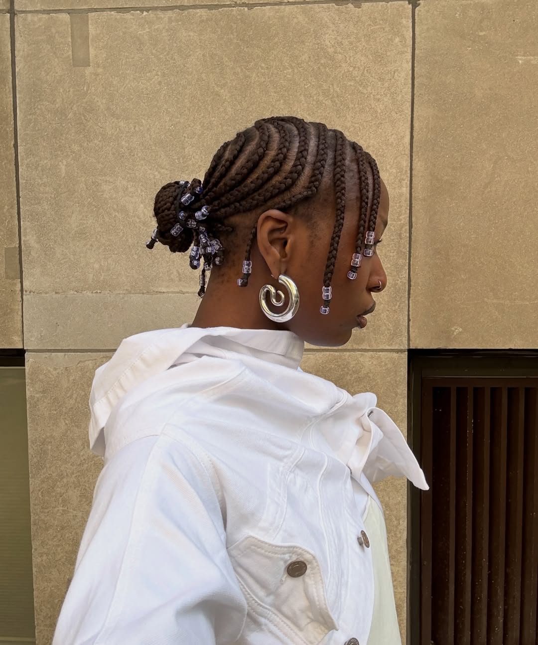 Low Bun With Individual Braids and Beads Low Bun With Individual Braids and Beads — Simple Bun Braids